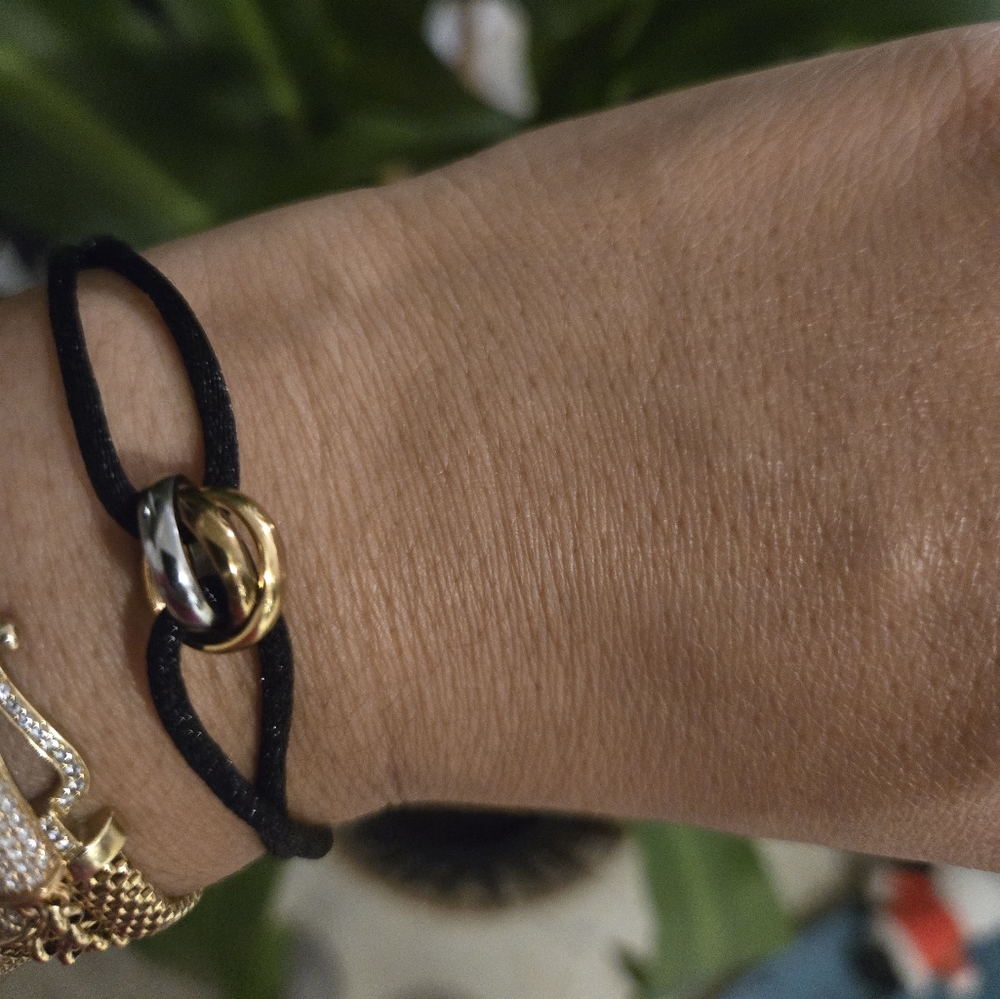 Elegant Gold and Silver Knot Bracelet
